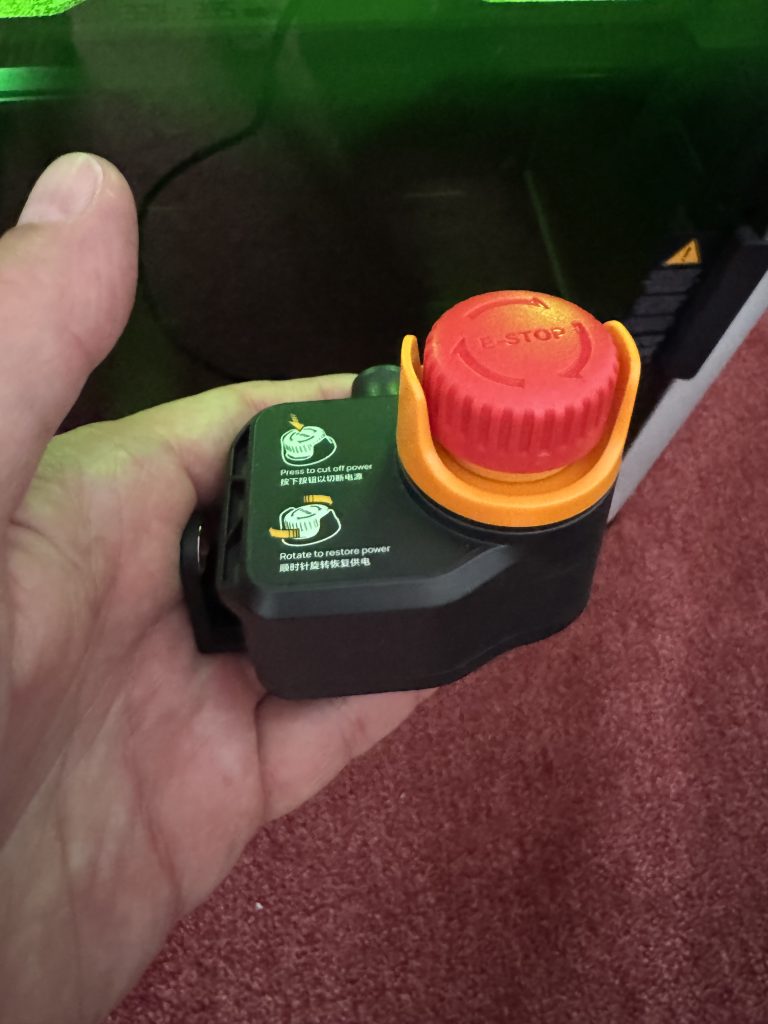 Notknopf für die Laserfunktion